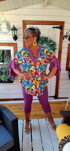 Fashion by Nono Gigi ing, virág mintás-lila szegéllyel és fodorral L méretben 
